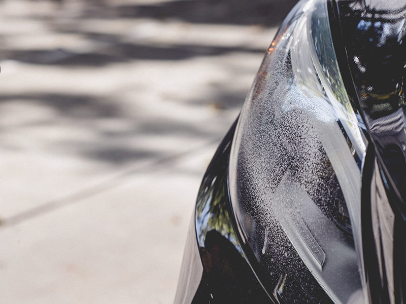 Foam and cleaner on a vehicle headlight
